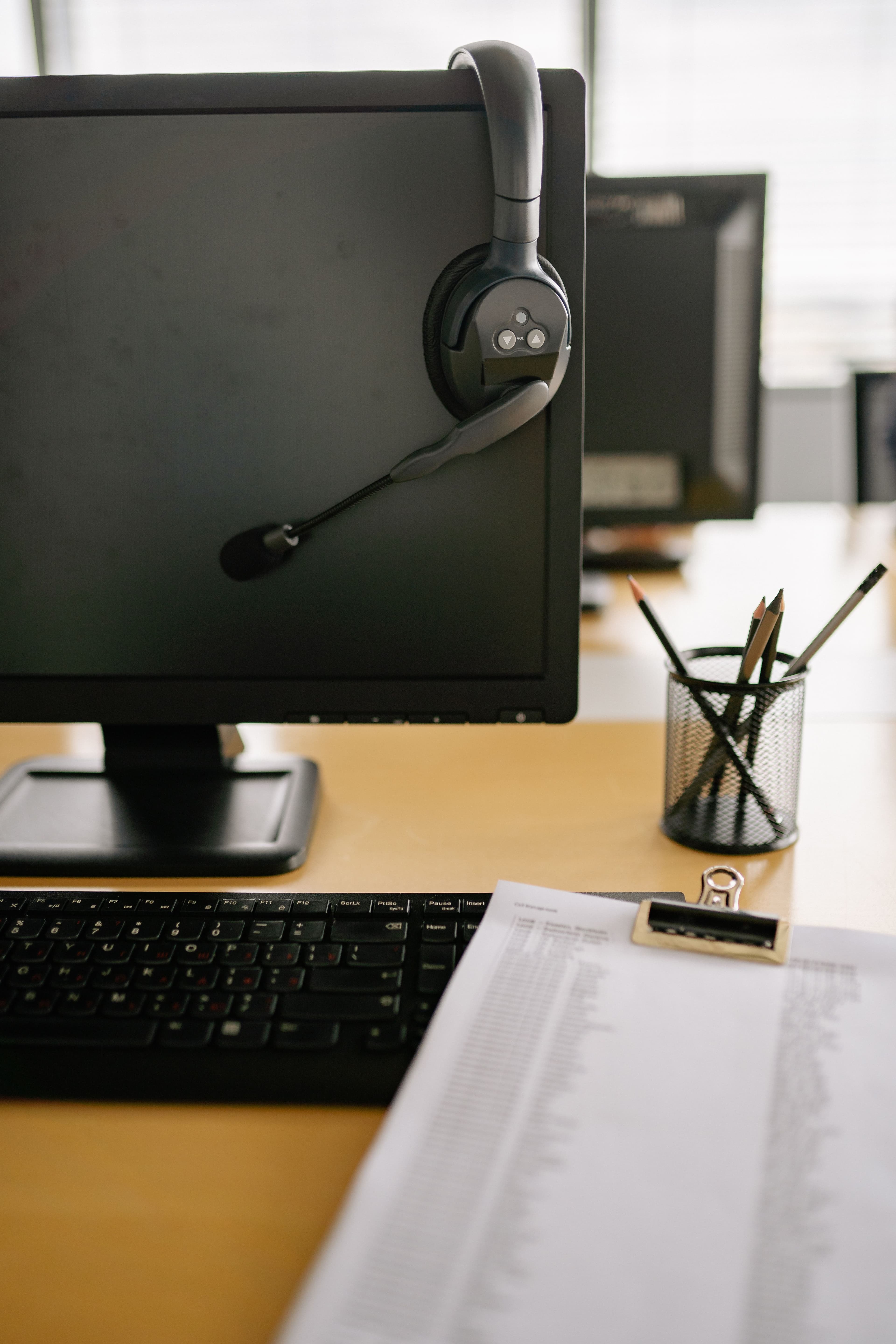 Support plan photography showing a headset on a monitor